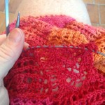In process airplane knitting; Lumiere Skirt in ModeKnit MCN Flow (Spessartine)